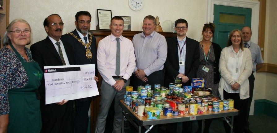 Staff help out foodbank this summer