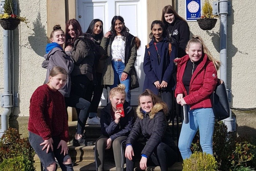 Young women work together for a #BalanceForBetter